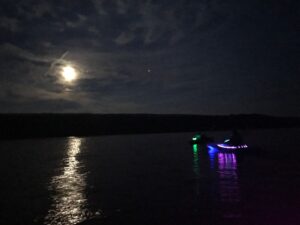 boat during a full moon paddle